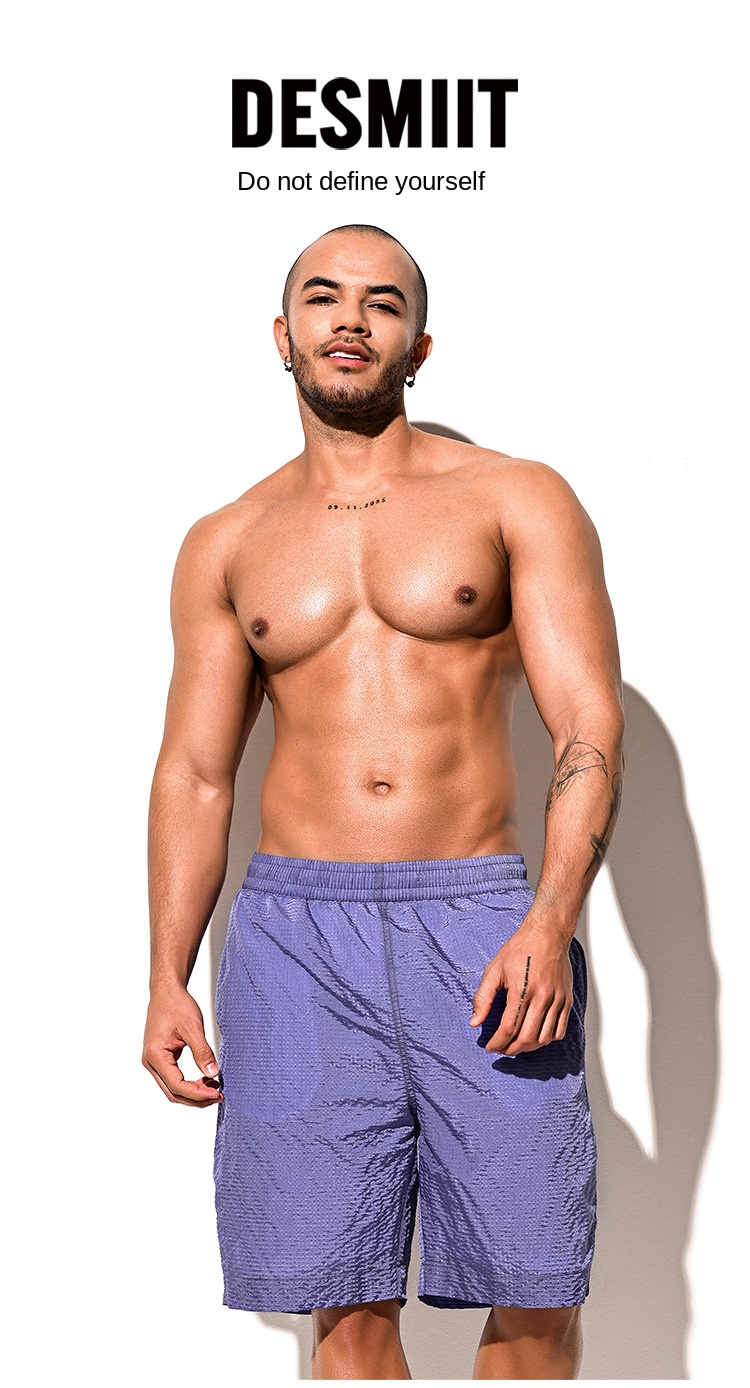 Man wearing Desmiit Beach Pants Swim Trunks